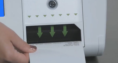 ev6 Animated white hand with dark pink nail polish retrieves a white ballot card from a white voting machine